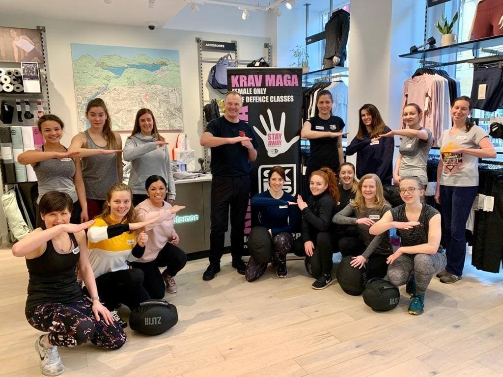 people facing the camera and smiling